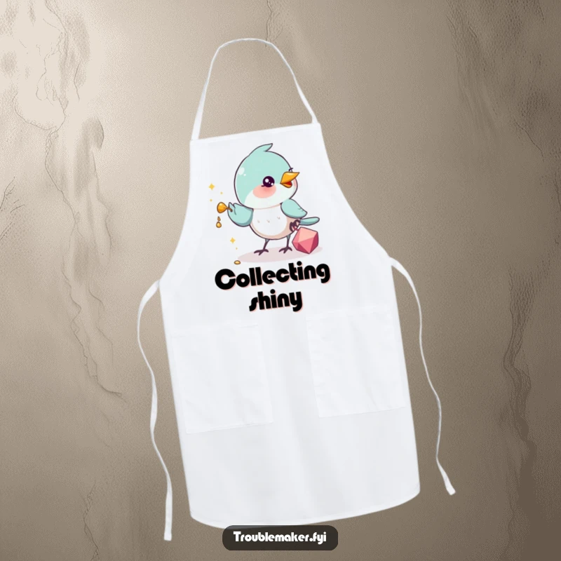 Funny Apron depicting a bird with a shiny trinket in its beak, ready to 'steal' delicious treats, perfect for a humorous kitchen experience.