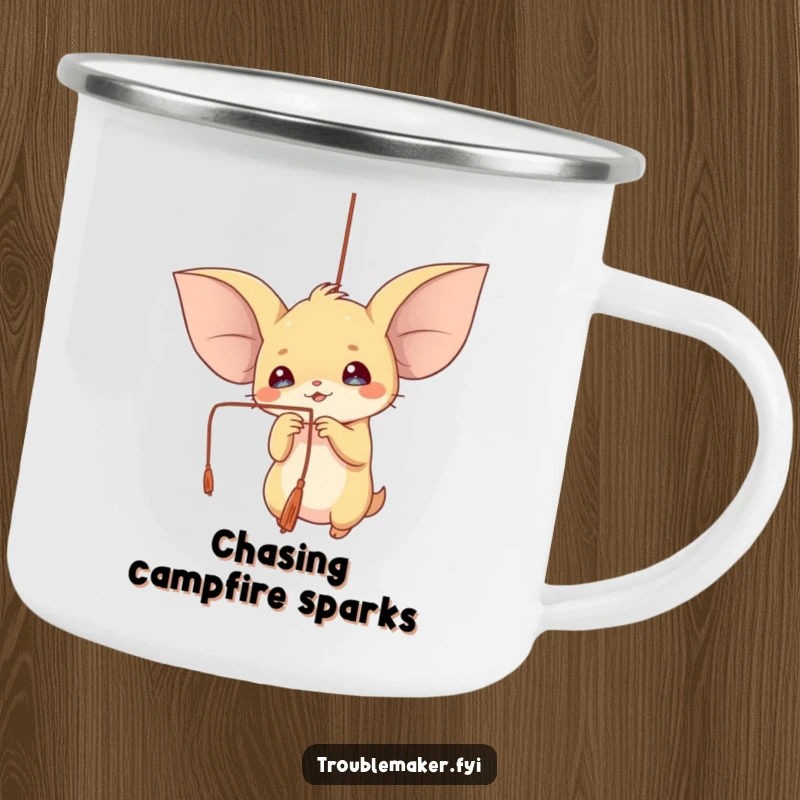 Funny camping mug with a creature with large ears playfully batting at a dangling string, perfect for outdoor fun.