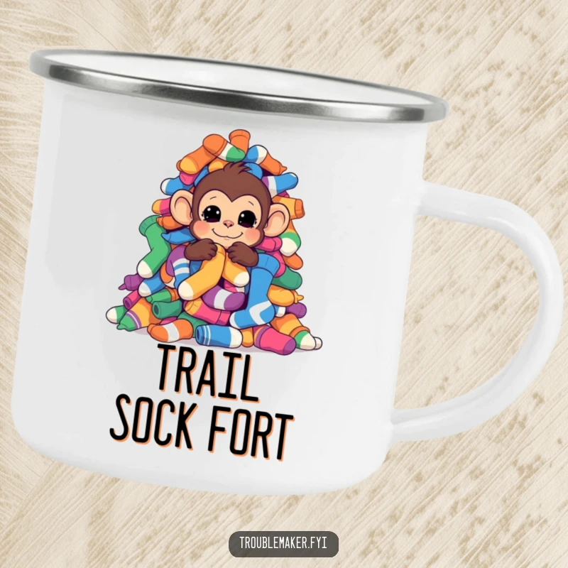 Funny monkey hiding behind colorful socks on a durable camping mug, perfect for outdoor fun.