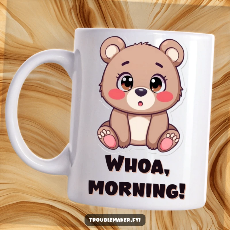 Funny Mug depicting a cute bear cub with incredibly wide, surprised eyes, capturing a moment of pure astonishment and adorable shock.