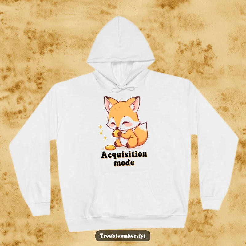 Funny hoodie featuring a playful fox with a mischievous grin, artfully snatching a shiny object, blending comfort and humor.