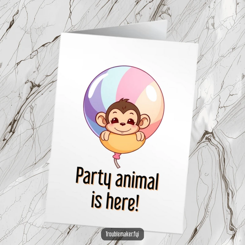 Funny Free Printable Birthday Card: Mischievous monkey peeking from behind a giant colorful balloon, ready to party.