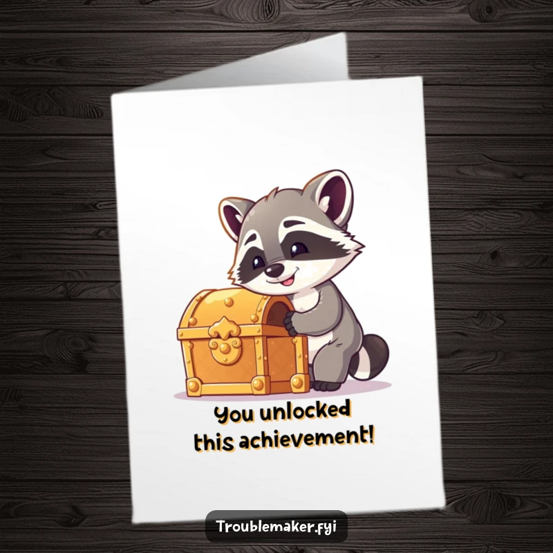 Funny Free Printable Congratulations Card: Cheeky raccoon focused on picking the lock of a gleaming treasure chest.