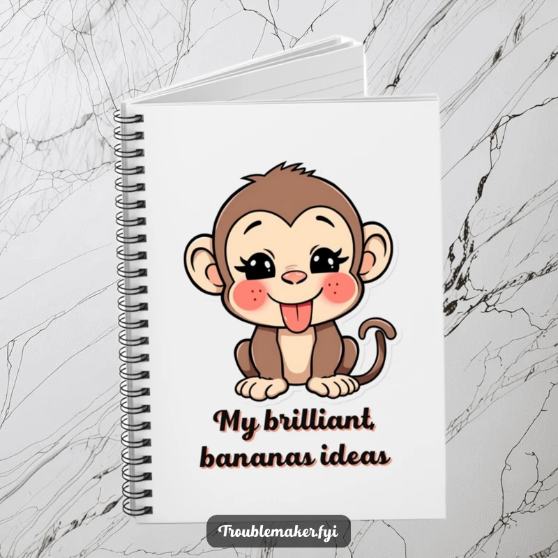 Funny monkey notebook featuring a playful character sticking its tongue out and winking, ideal for jotting down notes with humor.